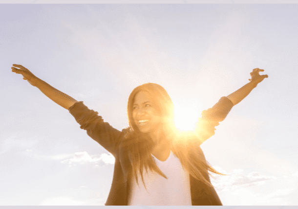 Woman standing in the sun